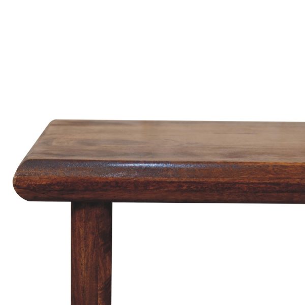 Detail of the natural finish on the table’s edge.