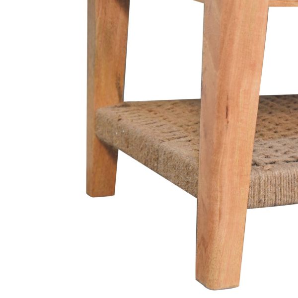 Close-up of table leg and rope shelf detail