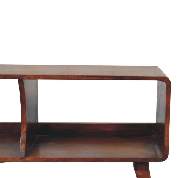 View of the open storage space with shelves for books or accessories.