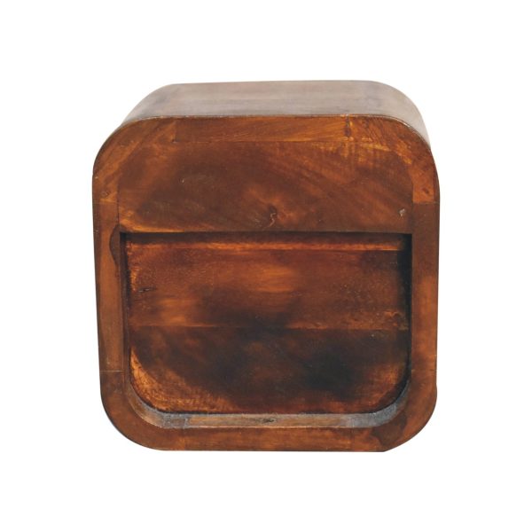 Front view of the small mango wood bedside table with curved edges and Nordic-style legs.