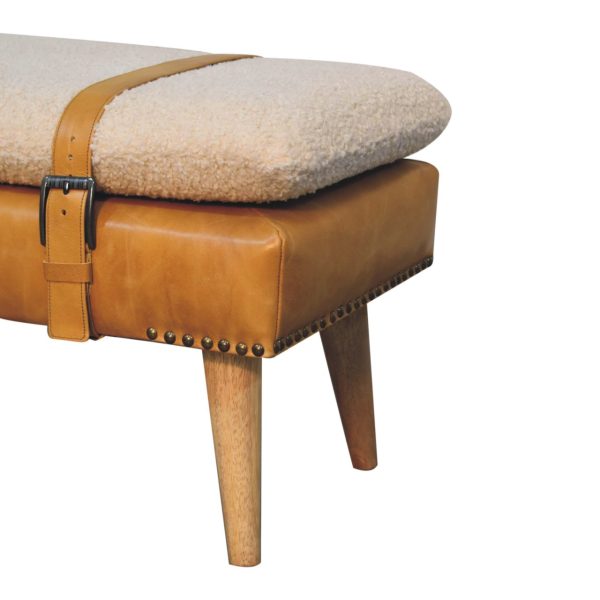 Upholstered bench, side view with oak leg.