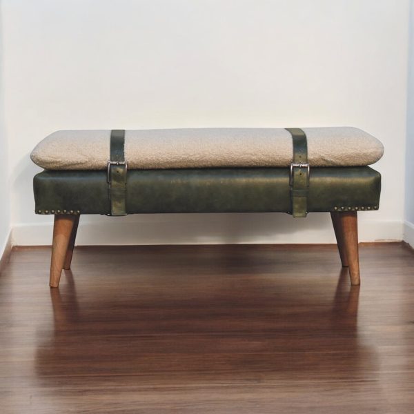 Upholstered bench, front view with belted strap.