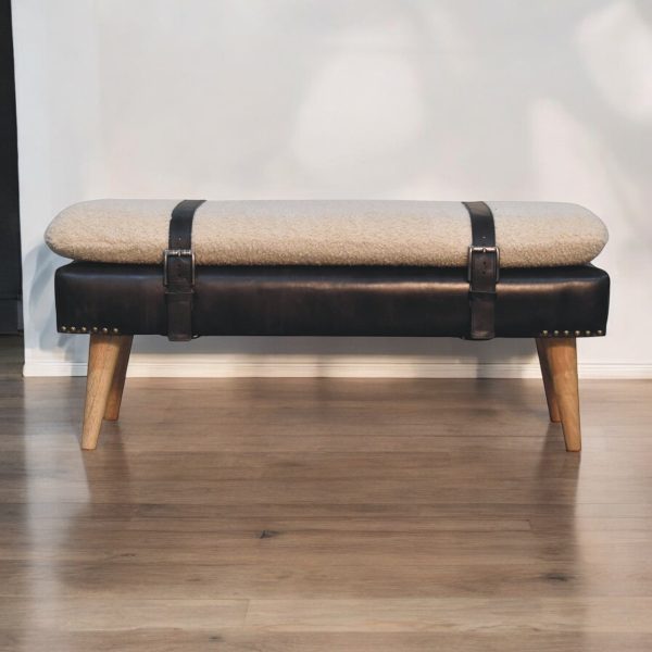 Upholstered bench, highlighted front view with belted strap.