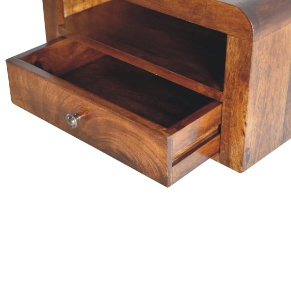 Mango wood bedside unit with open drawer.