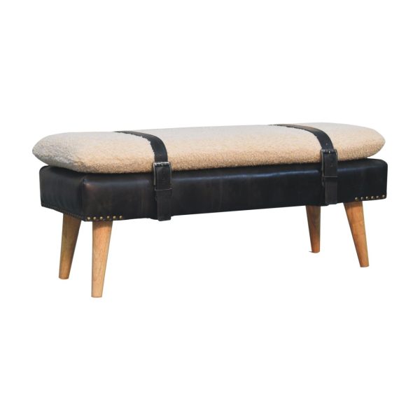 Upholstered bench, angled view with oak legs.